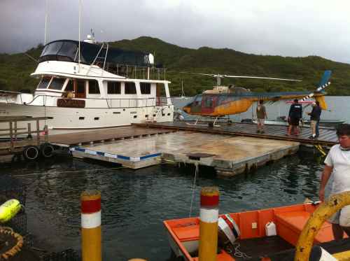 A floating platform built to take a helicopter