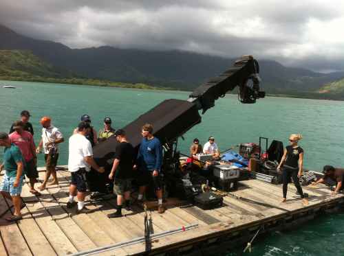 A Technocrane rigged on a dock platform at Kāneʻohe